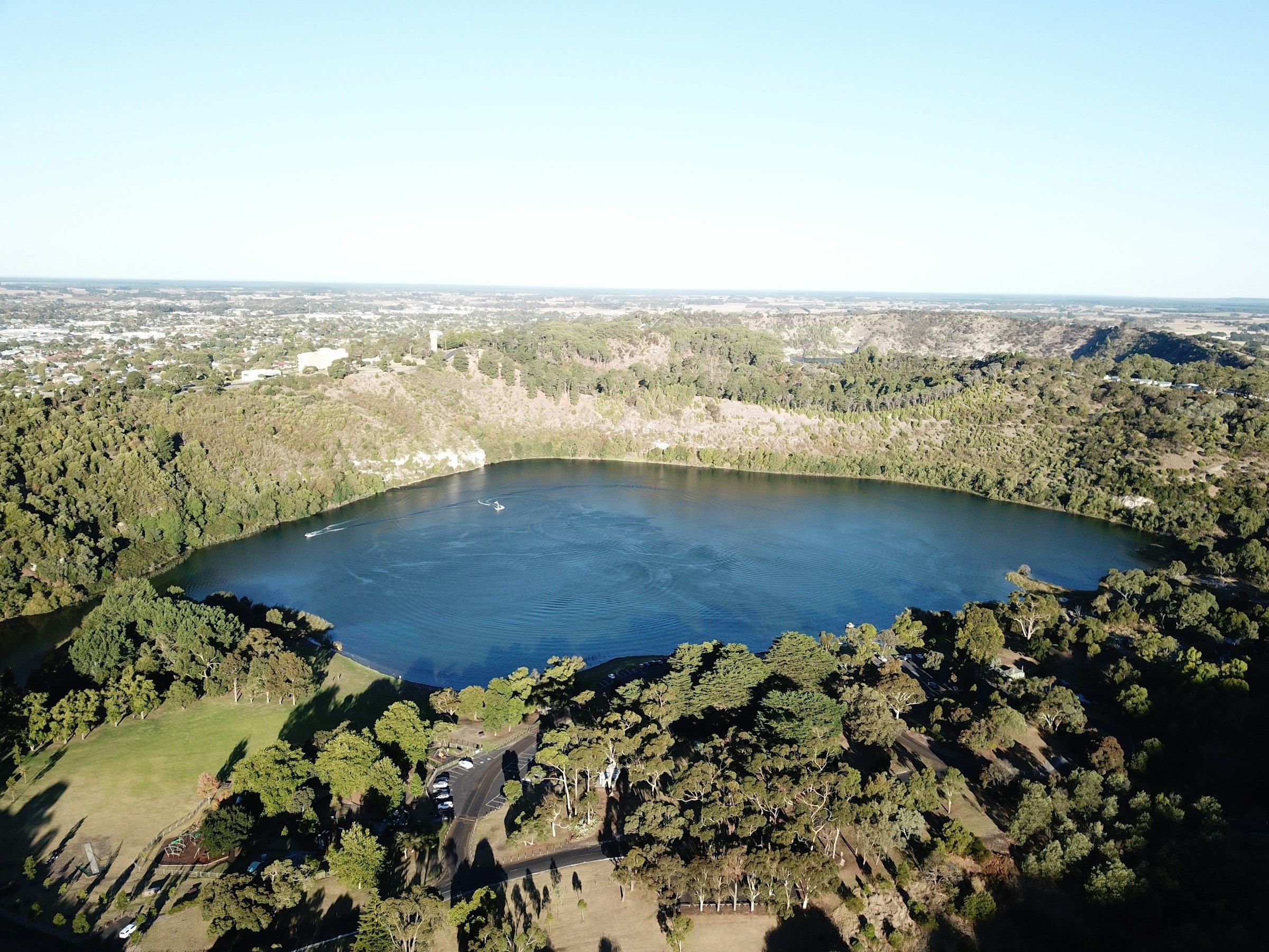 Mount Gambier's Blue Lake showing its vibrant turquoise waters and surrounding landscape